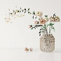 Woven Vase with Pink and Beige Flowers Green Leaves on White Background