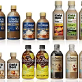Diverse Bottled Coffee Drinks With Various Flavors And Multiple Brand Varieties
