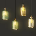 Modern Glass Pendant Lights With Green Transparent Shades And Gold Metal Accents Illuminated