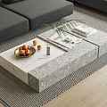 Modern Marble Top Coffee Table With Fresh Fruits Green Plant And Magazines By Gray Sofa