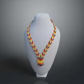 Colorful Handwoven Necklace Displayed On White Mannequin With Striped Design