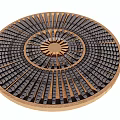 Garden Ornament Featuring Circular Mosaic Pattern With Gold Black Tiles And Radiating Design