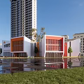 Modern School Building With Orange Red White Facade Long Windows And Reflection On Wet Ground