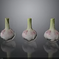 Three Fresh Garlic Bulbs With White Pink Skin And Green Stems On Black Surface