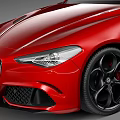 Red Sporty Sedan With Sleek Body Black Rims And Aerodynamic Exterior Design