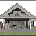 Modern Detached Villa With Gabled Roof Large Glass Windows And Green Lawn
