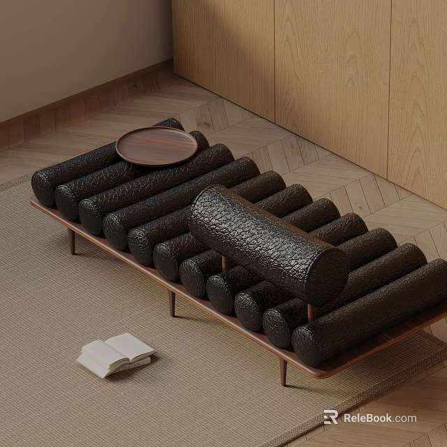 Modern Black Textured Cylindrical Sofa Bench With Wooden Frame And A Book Beside 3d model 