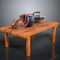 Heavy Weapon With Red Circular Details Metallic Body And Brown Grip On Simple Wooden Table