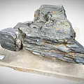 Geological Layered Stone Specimens On Wooden Display Base With Small Label