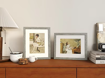 Two Vintage Picture Frames With Portraits On Wooden Dresser With Lamp Mugs And Books 3d model