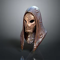 Detailed Hooded Bronze Mask Featuring Intricate Carvings And Ornamental Design