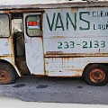 Old Rusty VANS Truck with Worn Out Body and Vintage Exterior