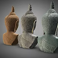 Three Buddha Head Sculptures Intricately Carved With Varied Colors And Classic Features