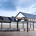 Commercial Street Outdoor Dining Area With Wooden Deck Seating And Shaded Roof Structure