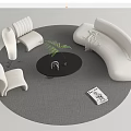 White Curved Sofa And Black Round Coffee Table With Green Plant Chairs Gray Rug Magazine