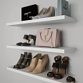 Various Stylish Shoes Placed on White Shelves with Chanel Bag Pink Purse and Boxes