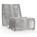 Green Woven Modern Lounge Chair with Matching Ottoman for Outdoor Relaxation