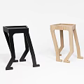 Modern Side Tables With Black And Light Wood Finishes And Unique Leg Design
