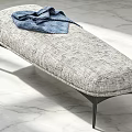 Gray Textured Fabric Sofa Bench With Blue Blanket Black Metal Legs On Marble Floor