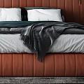Modern Double Bed with Orange Leather Headboard Deep Blue Wall Art and Gold Sconces