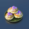 Three Freshly Baked Muffins on Green Plate with White Icing and Purple Sprinkles