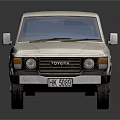 White Toyota Off Road Vehicle With Classic Design And Reflective Exterior