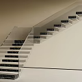 Modern Staircase With Black Marble Steps And Transparent Glass Railing