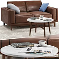 Brown Leather Sofa With Gray Blue Pillows And Marble Coffee Table On Patterned Rug 3d model