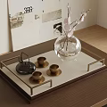 Elegant Tea Set with Black Teapot Golden Cups on Decorative Tray with Glass Vase