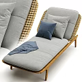 Comfortable Lounge Chair With Wooden Frame Rattan Backrest Gray Cushion Blue Pillow And Gray Blanket
