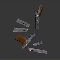 Metallic Pistol Weapon with Multiple Magazines and Metal Parts Displayed on Black Surface