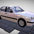 Shiny Classic White Sedan Featuring Black Stripes On Gray Stone Pavement