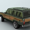 Vintage Dark Green SUV With Wooden Side Panels Classic Design And Alloy Wheels