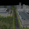 Multiple Industrial Warehouses With Green Landscaping Road Network And Sunset Sky