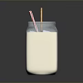 Clear Glass Cup With Milk Red And White Striped Straw And Yellow Ring Shaped Cookie