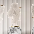 Three Elegant Transparent Sculptures Placed On Marble Bases With Striped Wall