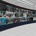 Monitoring Room Interior With Curved Console Multiple Computers And Blue Wall