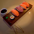 Assorted Fresh Sushi on Wooden Platter with Chopsticks and Soy Sauce Bowl