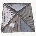 Snow Covered Corrugated Metal Roof With Multi Sloped Structure And Intersecting Ridges