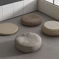 Round Floor Cushions With Diverse Textures In Modern Minimalist Room