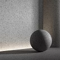 Gray Concrete Sphere Component With Speckled Wall And Floor Background