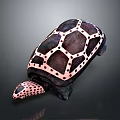 Hand Carved Turtle Sculpture With Purple Pink Geometric Patterns And Dotted Decoration