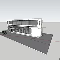 Grand Specialty Store Modern Glass Facade Building With Outdoor Tables Umbrellas And Chairs