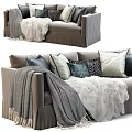 Cozy Two Seater Sofa With Soft Throw Blanket And Multiple Decorative Pillows
