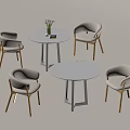 Modern Leisure Chairs With Light Cushions And Round Wooden Tables For Relaxation