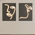 Modern Wall Decor Set of Two With Glowing Line Art Face Silhouette On Black Background