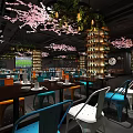 Modern Restaurant Space Featuring Cherry Blossom Decor Green Plants Wine Racks And Colorful Seats