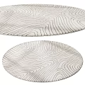 Light Colored Round Area Rug With Wavy Line Pattern For Living Room Decor