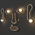 Modern Artistic Wall Lamps with Abstract Facial Shape Design and Warm Glow