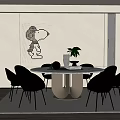 Modern Restaurant Interior With Round Dining Table Chairs Decorative Artwork And Potted Plant